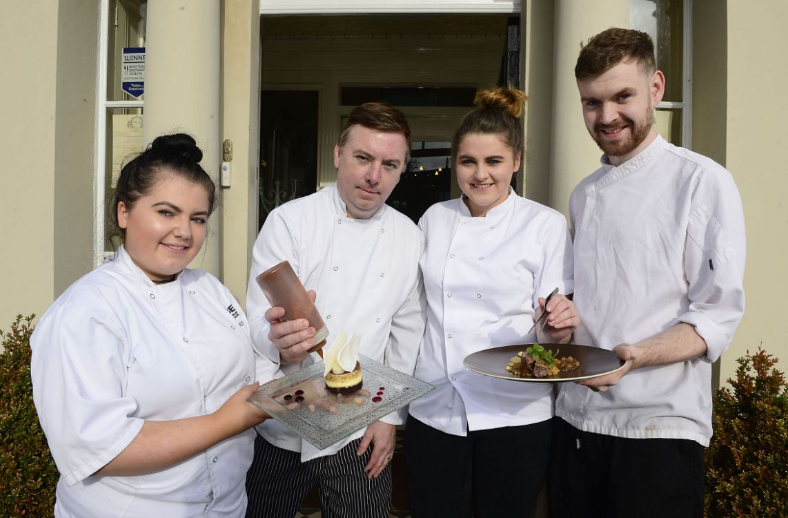 No 14 at the Georgian House Comber, one of the participating restaurants in the Government’s campaign to help boost the hospitality industry. Pictured (prior to lockdown) is head chef Jim Mulholland (second left), with past and present SERC students, Courtney Johnston, Rachel Carson and Conor McGrogan.